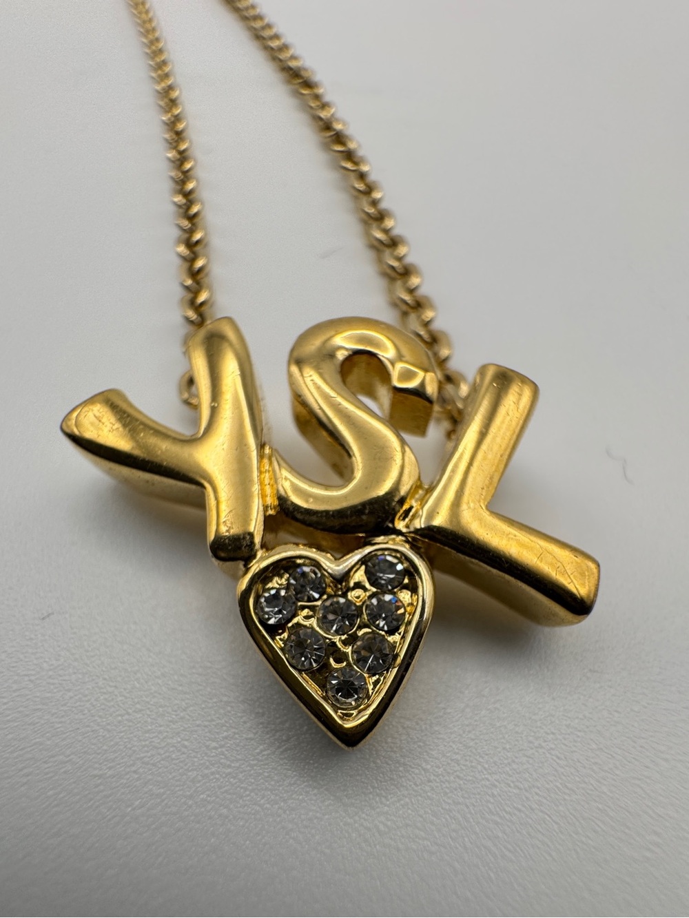 Yves Saint Laurent YSL Gold Tone 'YSL' Letter Pendant Necklace with Pave Heart A